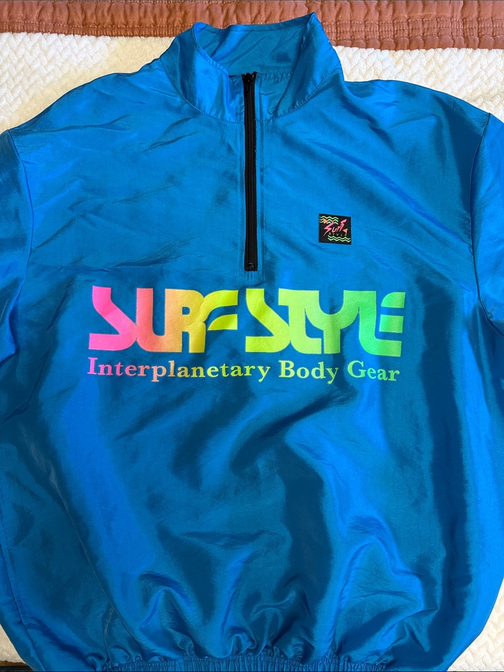 Unisex Surf Style Iridescent Interplanetary Windbreaker in Pacific Blue